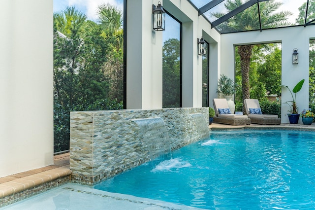 view of pool featuring pool water feature