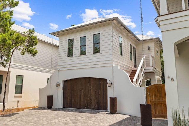 view of front of property with a garage