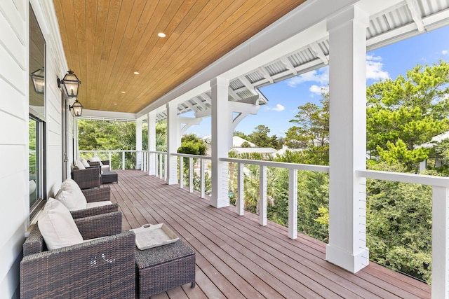 wooden deck featuring an outdoor living space