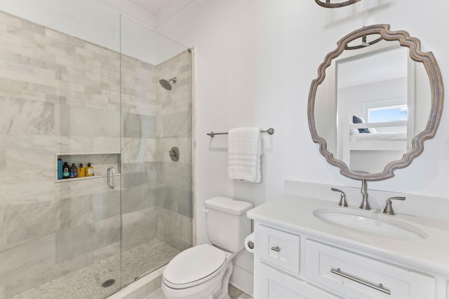 bathroom with toilet, vanity, crown molding, and a shower with shower door