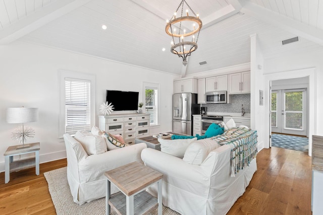 living room featuring wood ceiling, a chandelier, lofted ceiling with beams, and light wood-type flooring