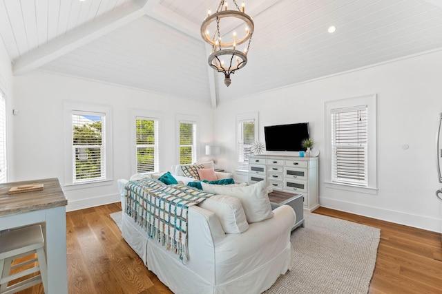 bedroom with an inviting chandelier, wood ceiling, lofted ceiling with beams, and hardwood / wood-style flooring