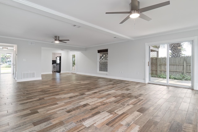 unfurnished living room featuring hardwood / wood-style flooring, crown molding, and ceiling fan