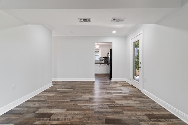 hall with dark wood-type flooring