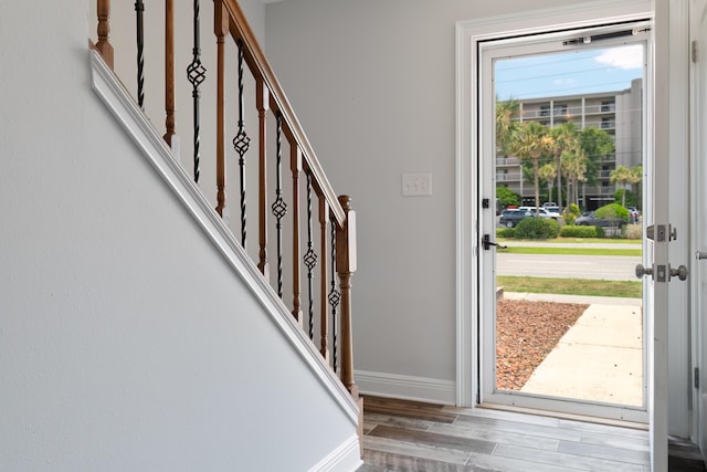 356 Billfish Ave Unit 8, Fort Walton Beach, FL 32548 - foyer featuring wood finished floors, baseboards, and stairs