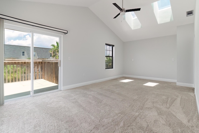 356 Billfish Ave Unit 8, Fort Walton Beach, FL 32548 - empty room featuring carpet, a ceiling fan, high vaulted ceiling, a skylight, and visible vents