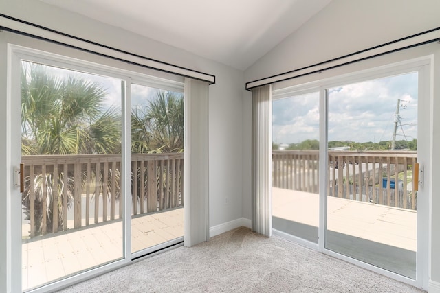 356 Billfish Ave Unit 8, Fort Walton Beach, FL 32548 - entryway with vaulted ceiling, baseboards, and carpet floors