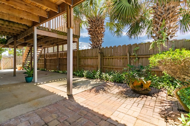 view of patio / terrace featuring a wooden deck