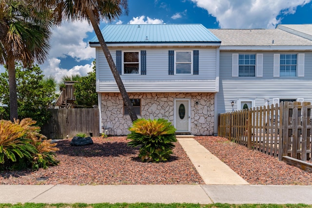 356 Billfish Ave Unit 8, Fort Walton Beach, FL 32548 - traditional-style house with fence private yard and stone siding