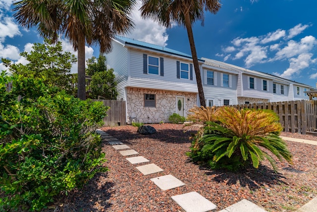 356 Billfish Ave Unit 8, Fort Walton Beach, FL 32548 - view of front of home with stone siding and fence