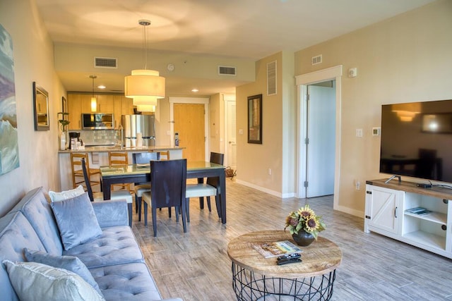 living room featuring light hardwood / wood-style flooring