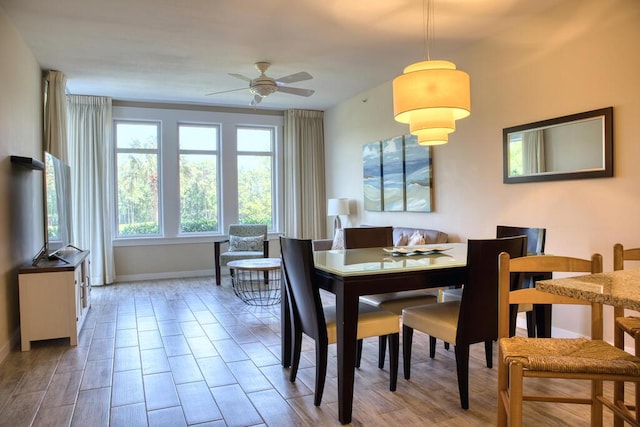 dining room featuring ceiling fan