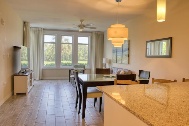 dining room with ceiling fan