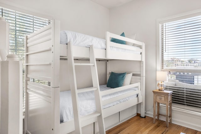 bedroom featuring wood-type flooring