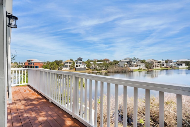 wooden terrace with a water view