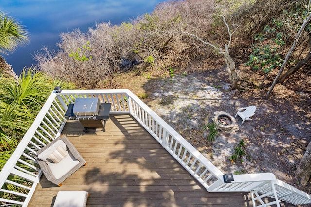 deck featuring a fire pit