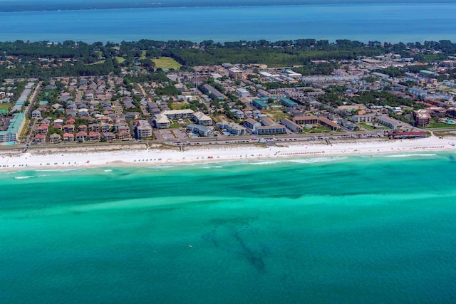 aerial view featuring a water view and a beach view