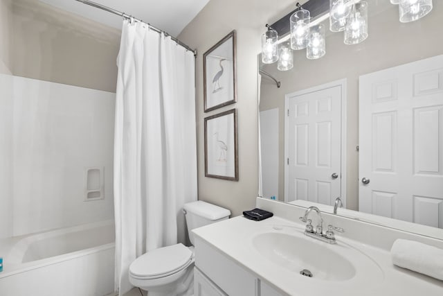 full bathroom with shower / tub combo, vanity, and toilet