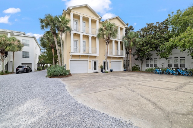 view of front of home featuring a balcony