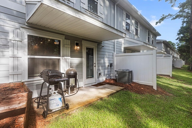 exterior space featuring grilling area and cooling unit