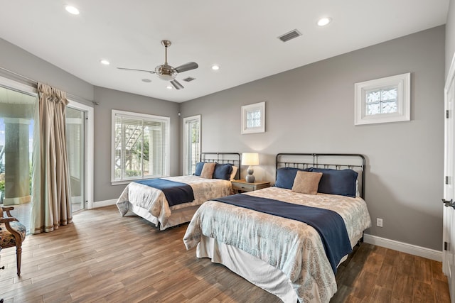 bedroom featuring ceiling fan and hardwood / wood-style floors