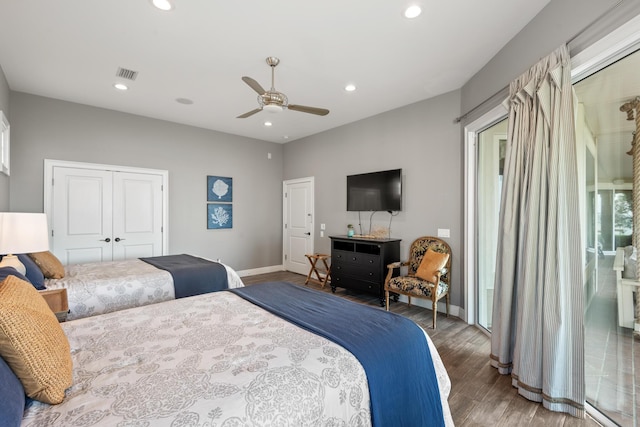 bedroom with ceiling fan, a closet, and dark hardwood / wood-style floors