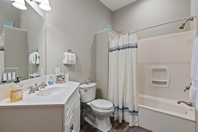 full bathroom with toilet, vanity, shower / bath combination with curtain, and hardwood / wood-style flooring