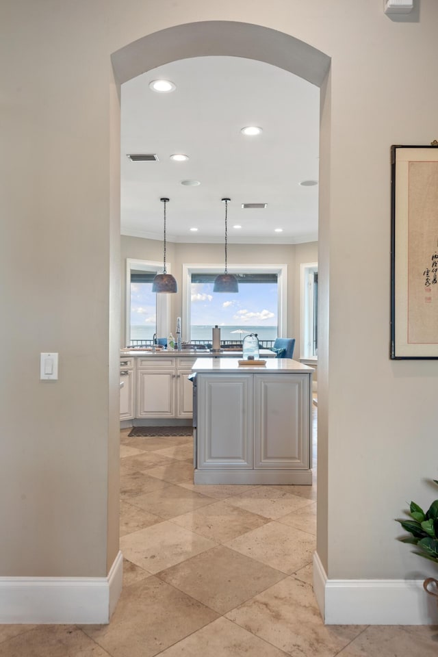 kitchen featuring pendant lighting and sink