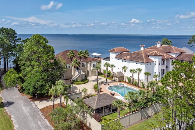 birds eye view of property featuring a water view