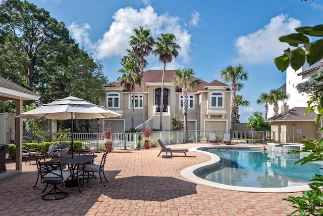 view of pool featuring a patio