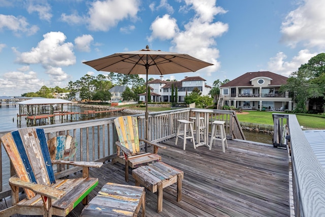 deck featuring a water view