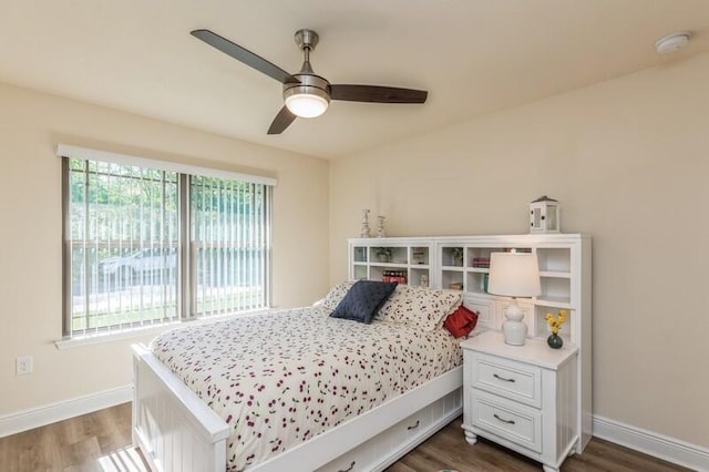 6022 Willsey Trl, Crestview, FL 32539 - bedroom featuring baseboards, dark wood-type flooring, and ceiling fan