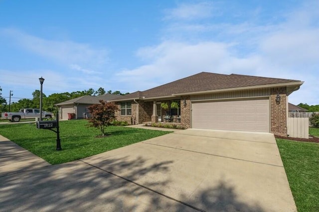 6022 Willsey Trl, Crestview, FL 32539 - ranch-style home featuring brick siding, an attached garage, concrete driveway, and a front yard