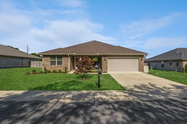 6022 Willsey Trl, Crestview, FL 32539 - ranch-style home featuring brick siding, a garage, concrete driveway, and a front lawn