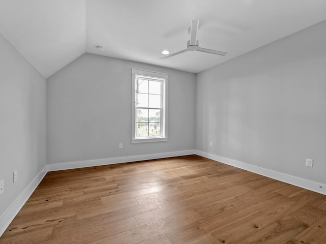 bonus room with ceiling fan, light wood-type flooring, and lofted ceiling