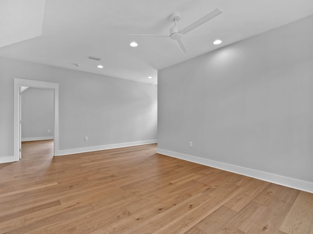 empty room featuring light hardwood / wood-style floors and ceiling fan