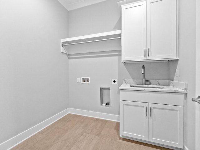 clothes washing area with sink, cabinets, hookup for a washing machine, light wood-type flooring, and electric dryer hookup