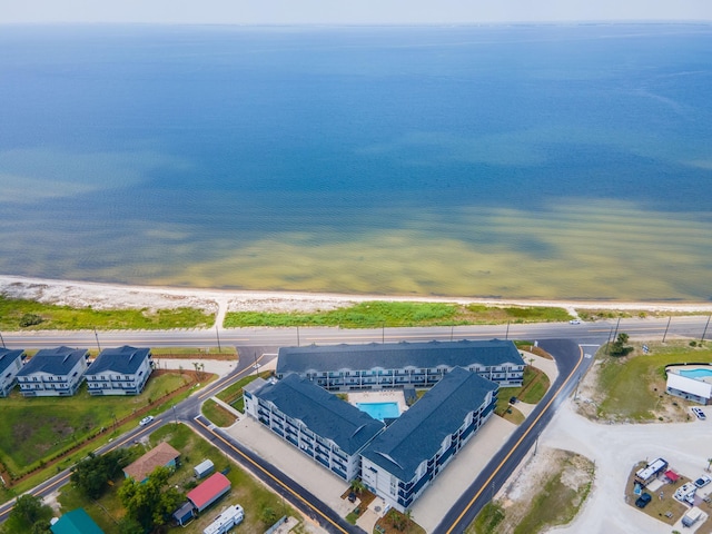 aerial view featuring a water view and a beach view