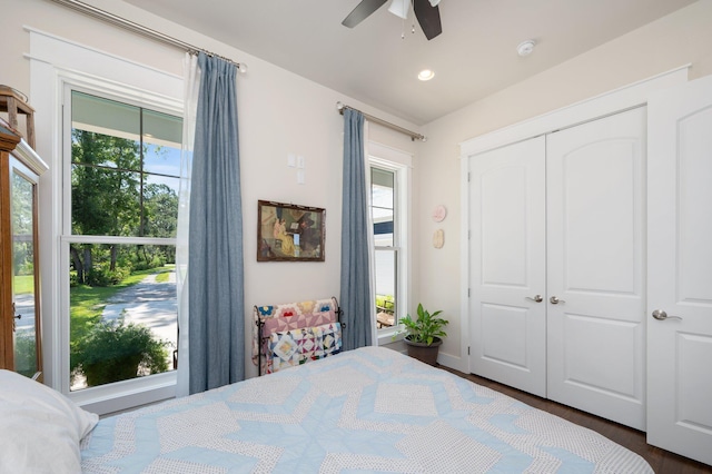 bedroom featuring a ceiling fan and a closet