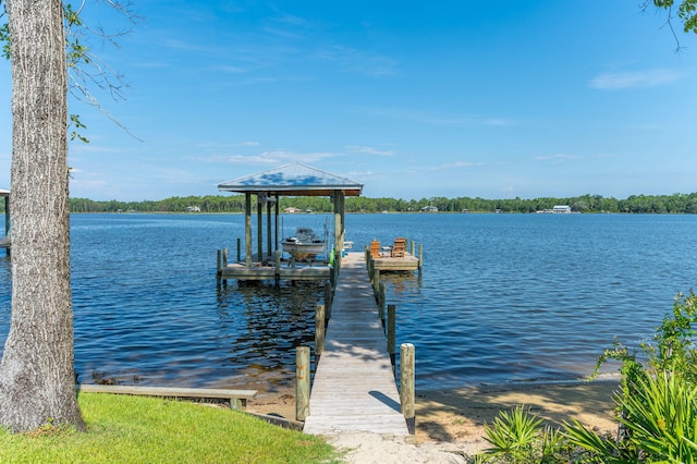 view of dock featuring a water view and boat lift