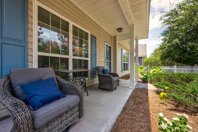 view of patio featuring a porch