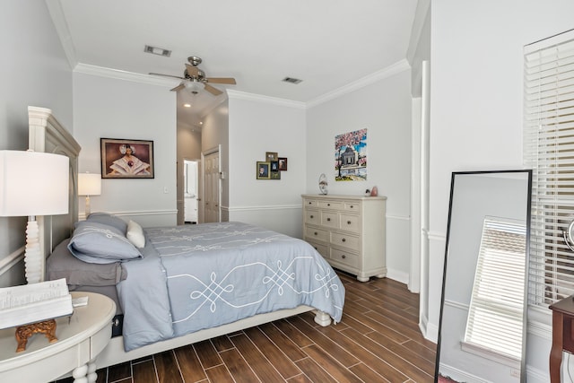 bedroom featuring wood tiled floor, visible vents, and crown molding