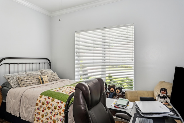 bedroom with crown molding