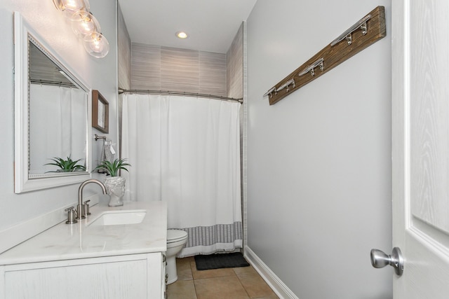 full bathroom featuring tile patterned flooring, toilet, vanity, baseboards, and a shower with curtain