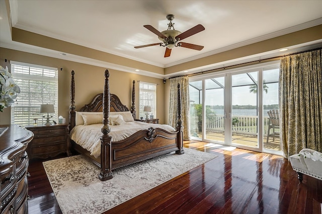 bedroom featuring ornamental molding and dark hardwood / wood-style floors