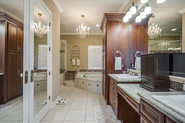 bathroom with tile floors, a notable chandelier, and ornamental molding