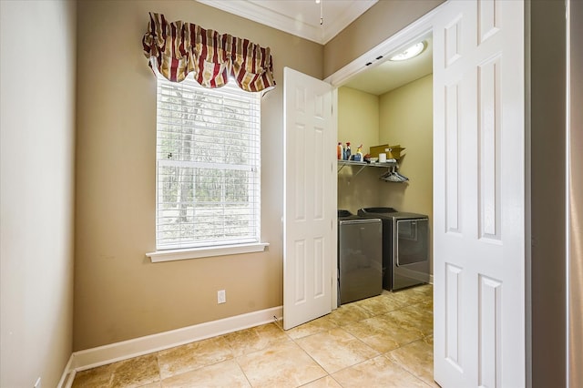 washroom with washer and clothes dryer, ornamental molding, and light tile flooring