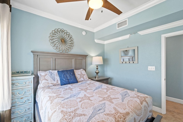 tiled bedroom with ceiling fan and ornamental molding