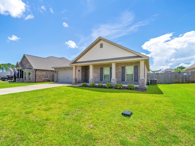 view of front facade featuring a garage, central AC, and a front lawn