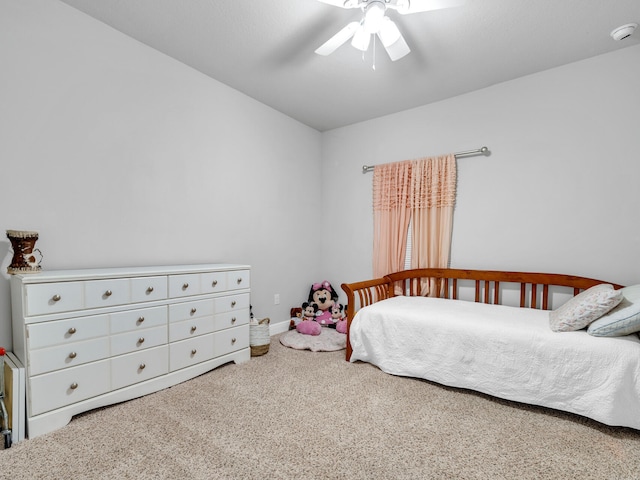 bedroom with ceiling fan and carpet floors